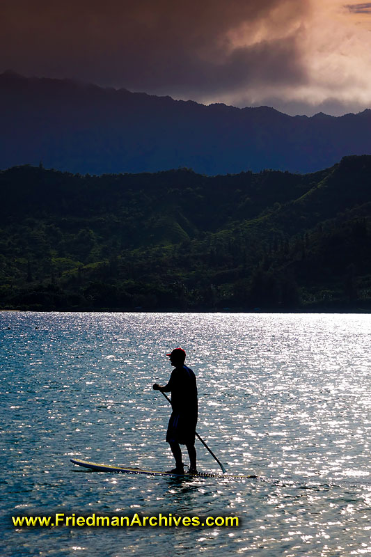 beach,hawaii,kauai,surfing,paddle board,paddleboard,water,ocean,travel,sports,vacation,holiday,silhouette,oar,man,